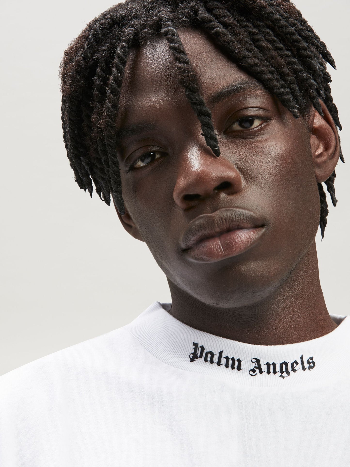 Palm angels logo over white t-shirt